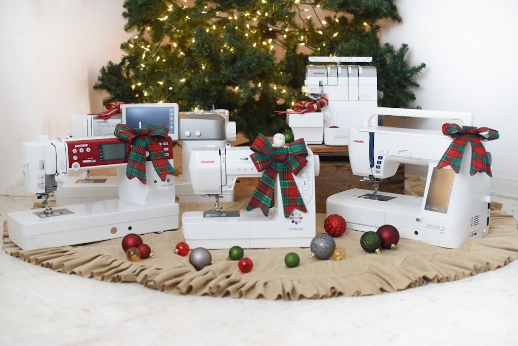 holiday sewing machines under christmas tree