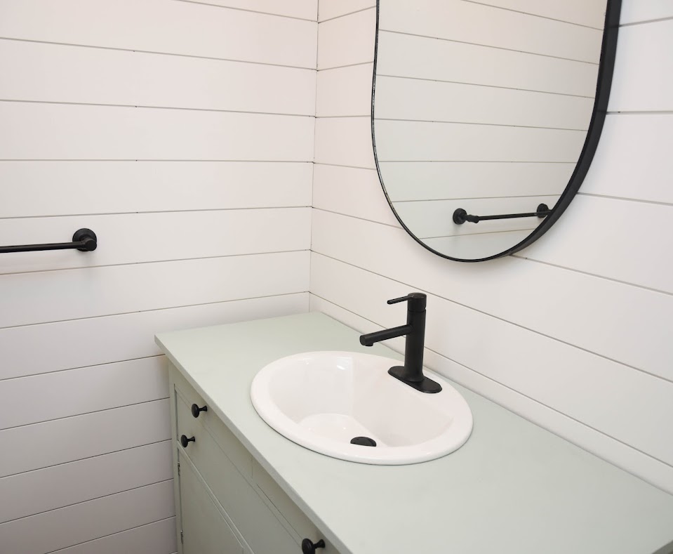 white farmhouse bathroom vanity sink